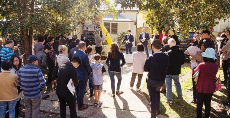 people-gather-for-auction-day-on-a-sunny-weather